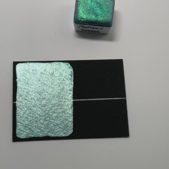 Shown with a swatch of Striking Spearmint for comparison